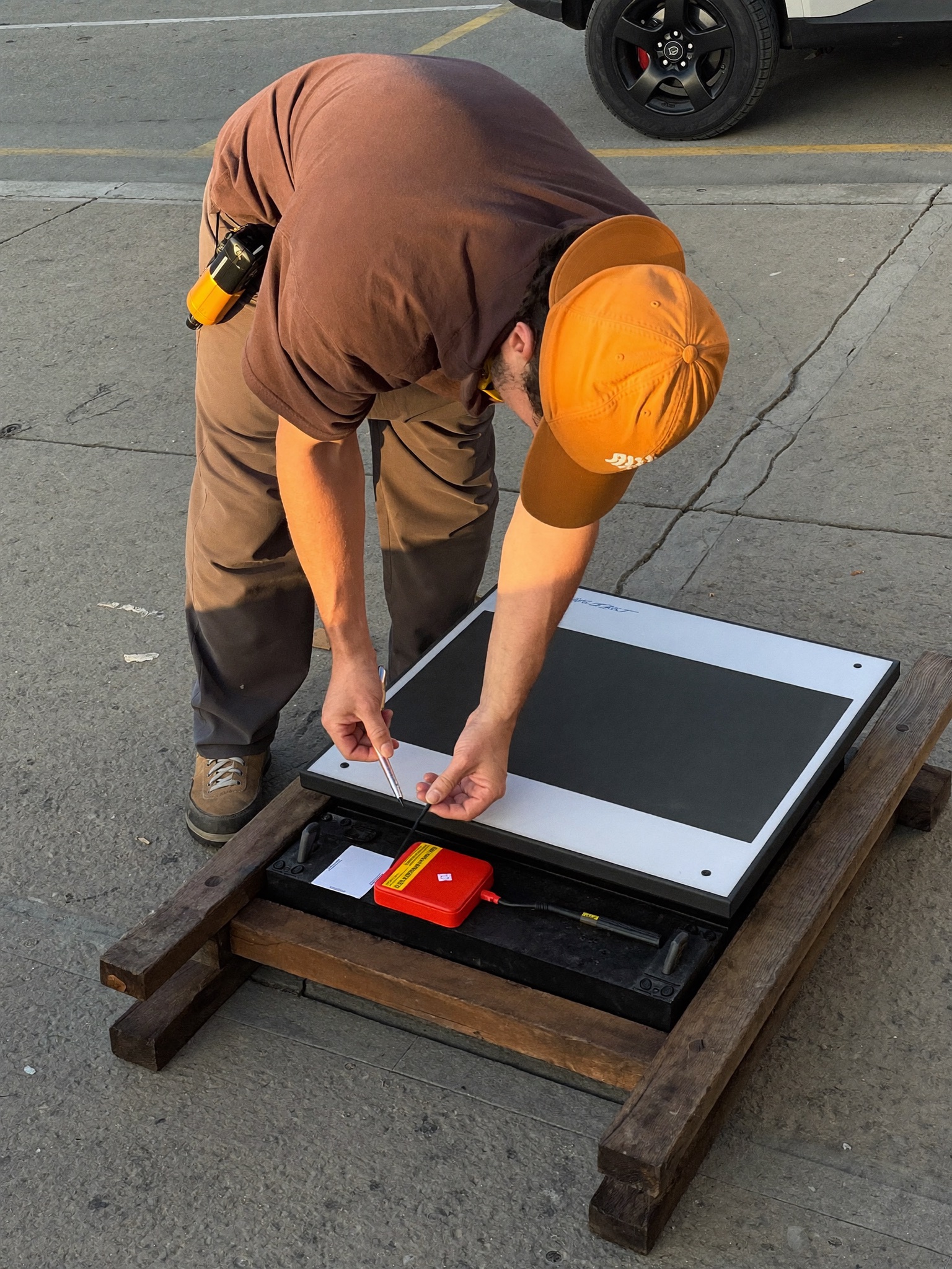 Electrician installing a new electrical panel