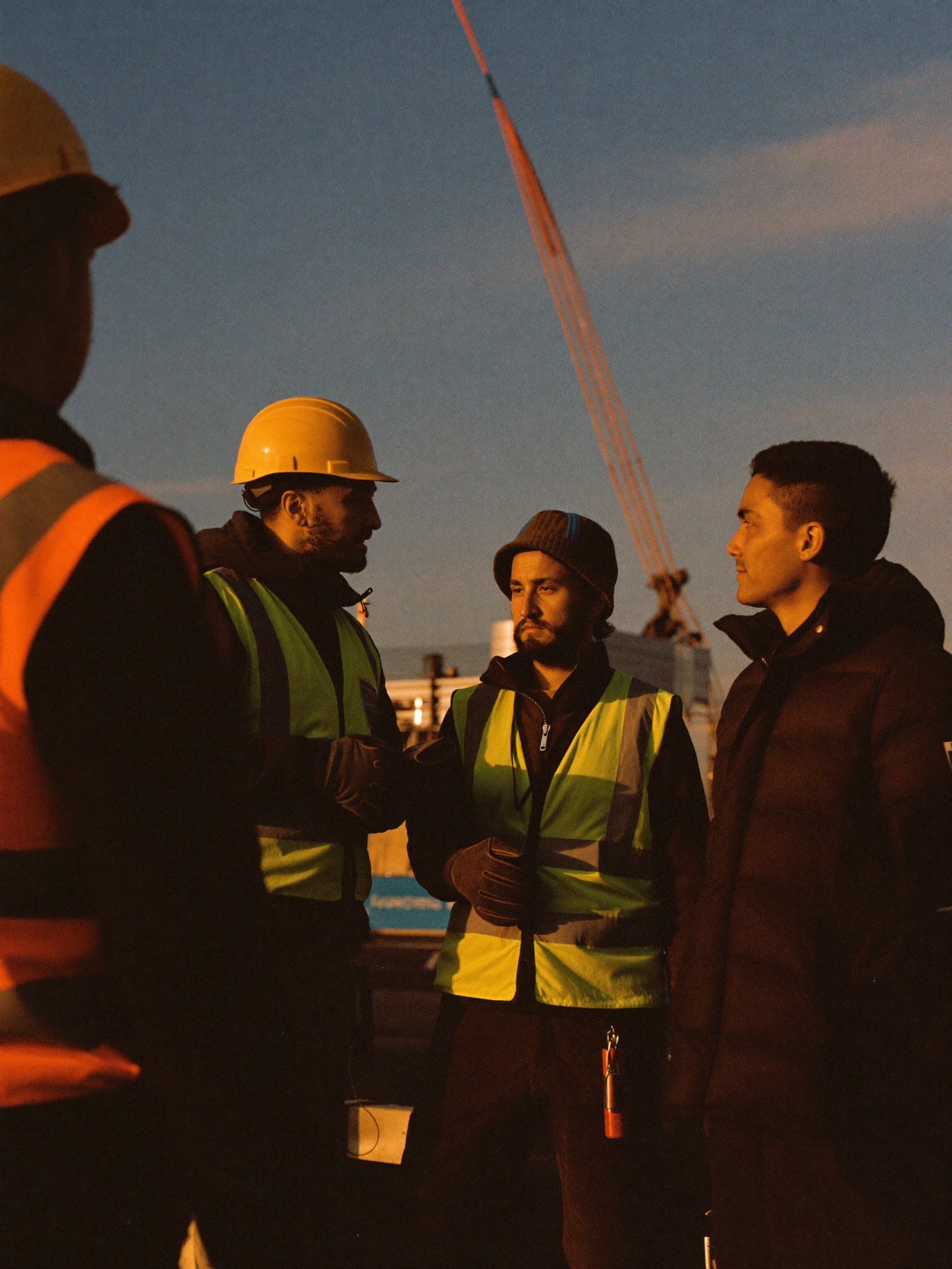 Crew shaking hands with a satisfied site contact