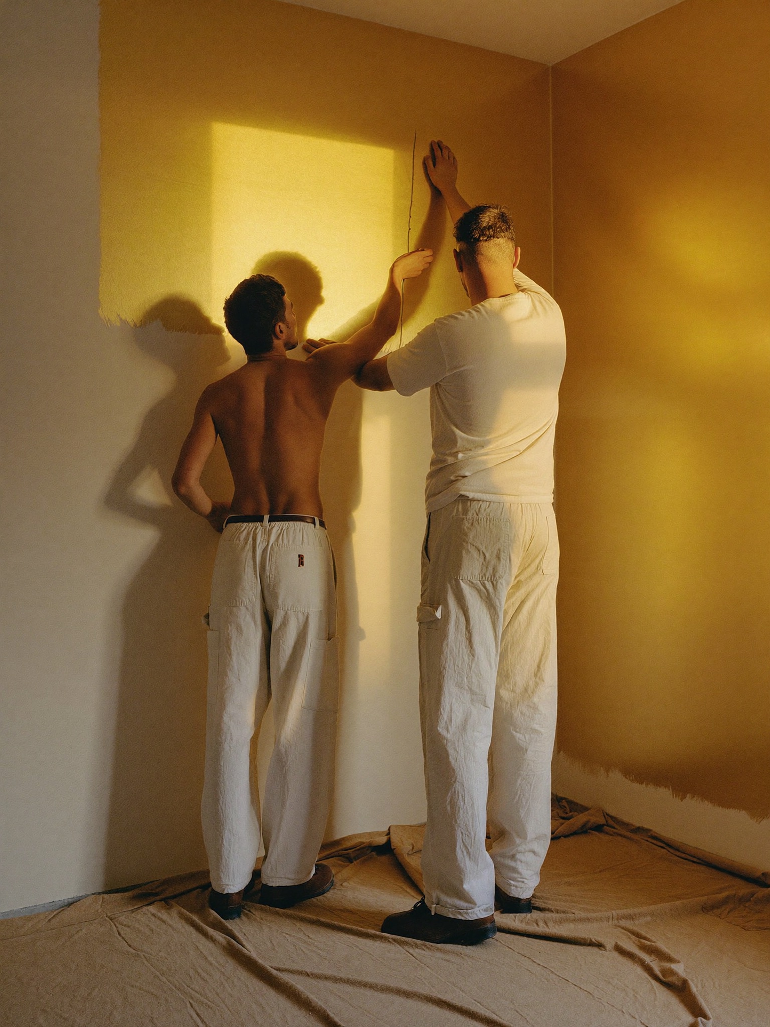 Painter checking the day's routed jobs at the service van